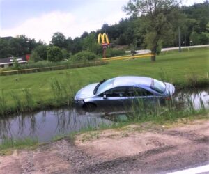 car in ditch