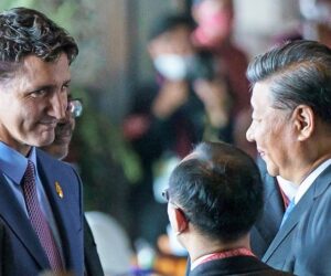 Canada's Prime Minister Justin Trudeau speaks with China's President Xi Jinping at the G20 Leaders' Summit in Bali