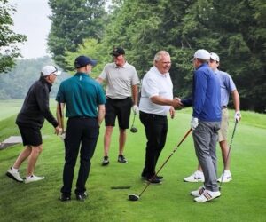 ford golf shaking hands 2