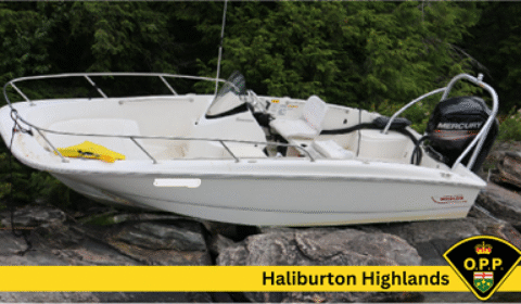 haliburton boat on rocks 3
