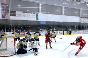 William Muszynski lefts fly on Hunstville goalie Darian Willis. William Muszynski lefts fly on Hunstville goalie Darian Willis.