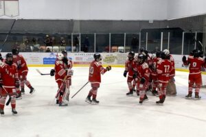 Team celebrates their sixth win. Team celebrates their sixth win.