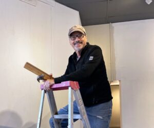 Photographer Terry Hrynyk was all smiles up the ladder.