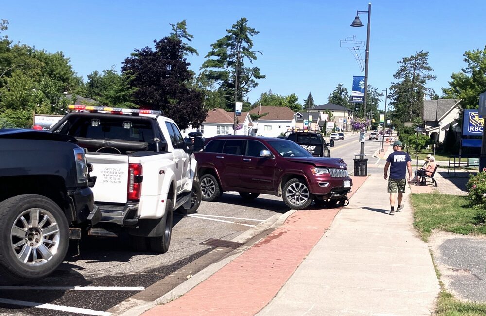 Muskoka Road North was blocked at Brown Street, but pedestrians could still wak by on the sidewalk in front of the bank. Muskoka Road North was blocked at Brown Street, but pedestrians could still wak by on the sidewalk in front of the bank.