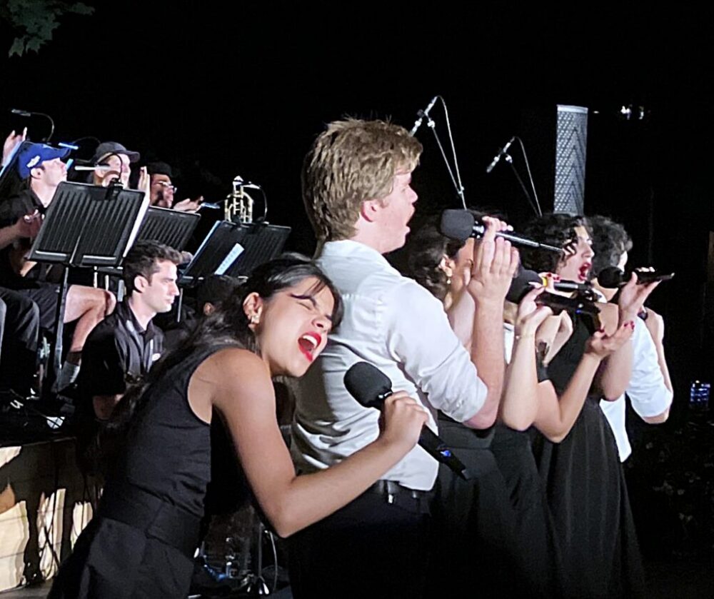 Sensational singers and musicians lit up the tennis court. Sensational singers and musicians lit up the tennis court.